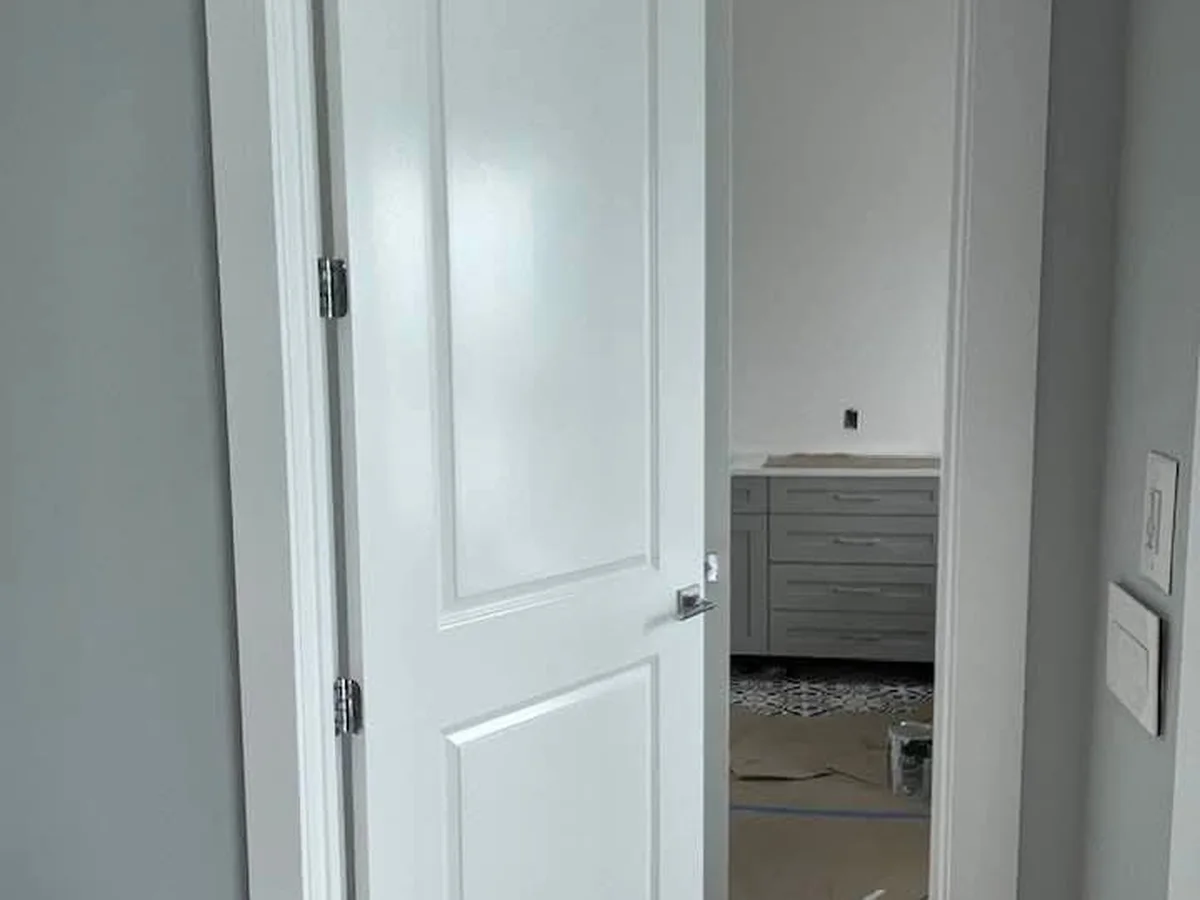 Interior door and frame sprayed white