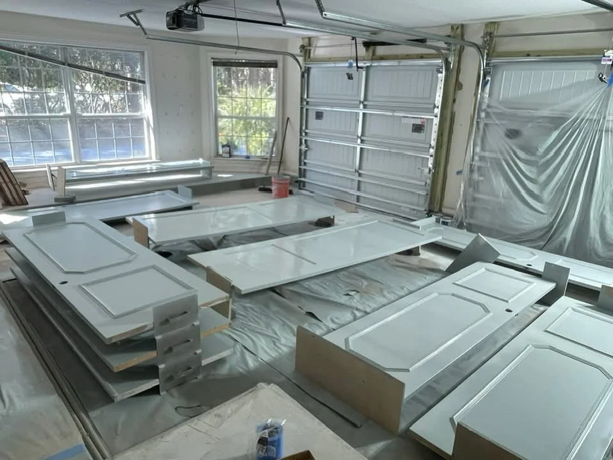 Doors and cabinet fronts laid out for spraying