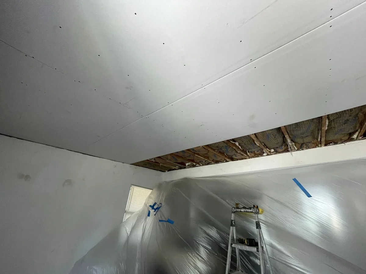 New drywall ceiling installed and taped